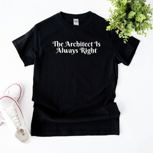 May include: Black t-shirt with white text that reads "The Architect Is Always Right".