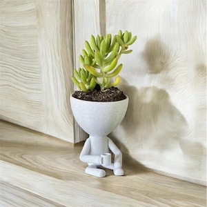 Relaxing Coffee Drinker&#39;s Planter – Unique Succulent Pot for Desk or Office Decor | Guy Holding Coffee Cup Planter | Bookworm human Pot