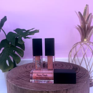 Honey Peach-  Honey & Peach flavored with coral color and hints of purple undertones