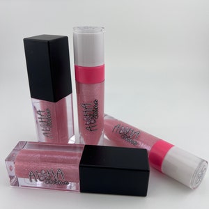 Pink Drink- Pink Drink flavored with shimmer and a hint of pink.