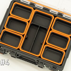 Puede incluir: Un organizador de herramientas negro y naranja con m&uacute;ltiples compartimentos. El organizador est&aacute; abierto y los compartimentos est&aacute;n vac&iacute;os. El texto "Set #4" es visible en la esquina inferior izquierda de la imagen.