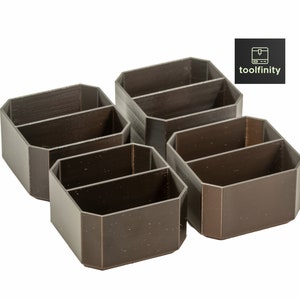 K&ouml;nnte beinhalten: Vier braune Plastik-Organizer mit jeweils zwei F&auml;chern. Die Organizer sind versetzt angeordnet.