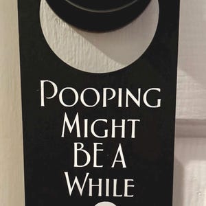 Pooping Door Hanger