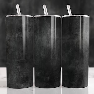 May include: Three tall, cylindrical tumblers with lids and straws. The tumblers have a dark, textured, mottled black design. The straws and lids are clear. The tumblers are displayed on a white surface against a dark gray background.