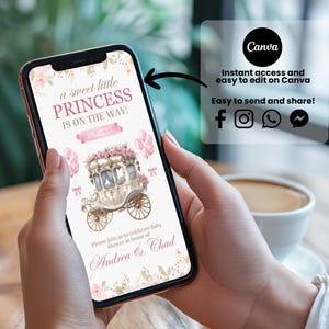 May include: A smartphone displays a baby shower invitation with the text "a sweet little PRINCESS IS ON THE WAY!" and "Andrea & Chad." The design features a floral carriage, pink balloons, and the Canva logo. The phone is held in a person's hands.