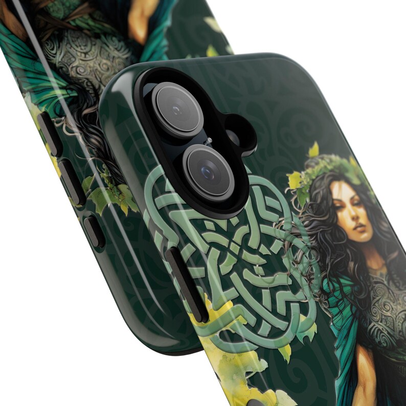 May include: A green and black phone case with a Celtic knot design and a woman with long dark hair and a green dress. The case has a raised camera bump with two lenses.