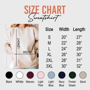 May include: A size chart for a sweatshirt, with measurements in inches. The chart includes sizes S to 3XL, with corresponding widths and lengths. Color options include black, white, maroon, light pink, light blue, navy blue, forest green, and sand.