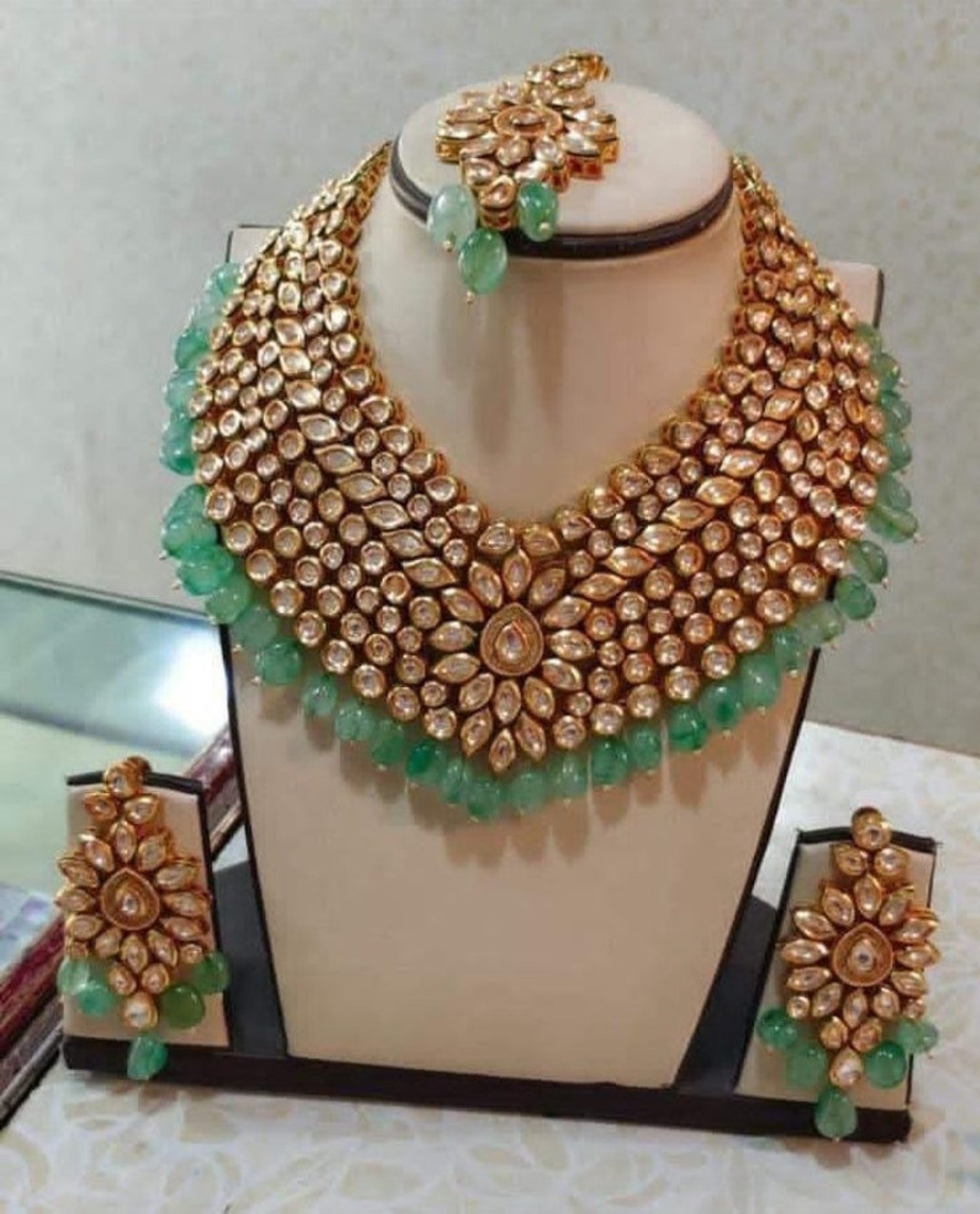 Party Wear Golden Jadau Kundan Necklace with Earrings main image 0