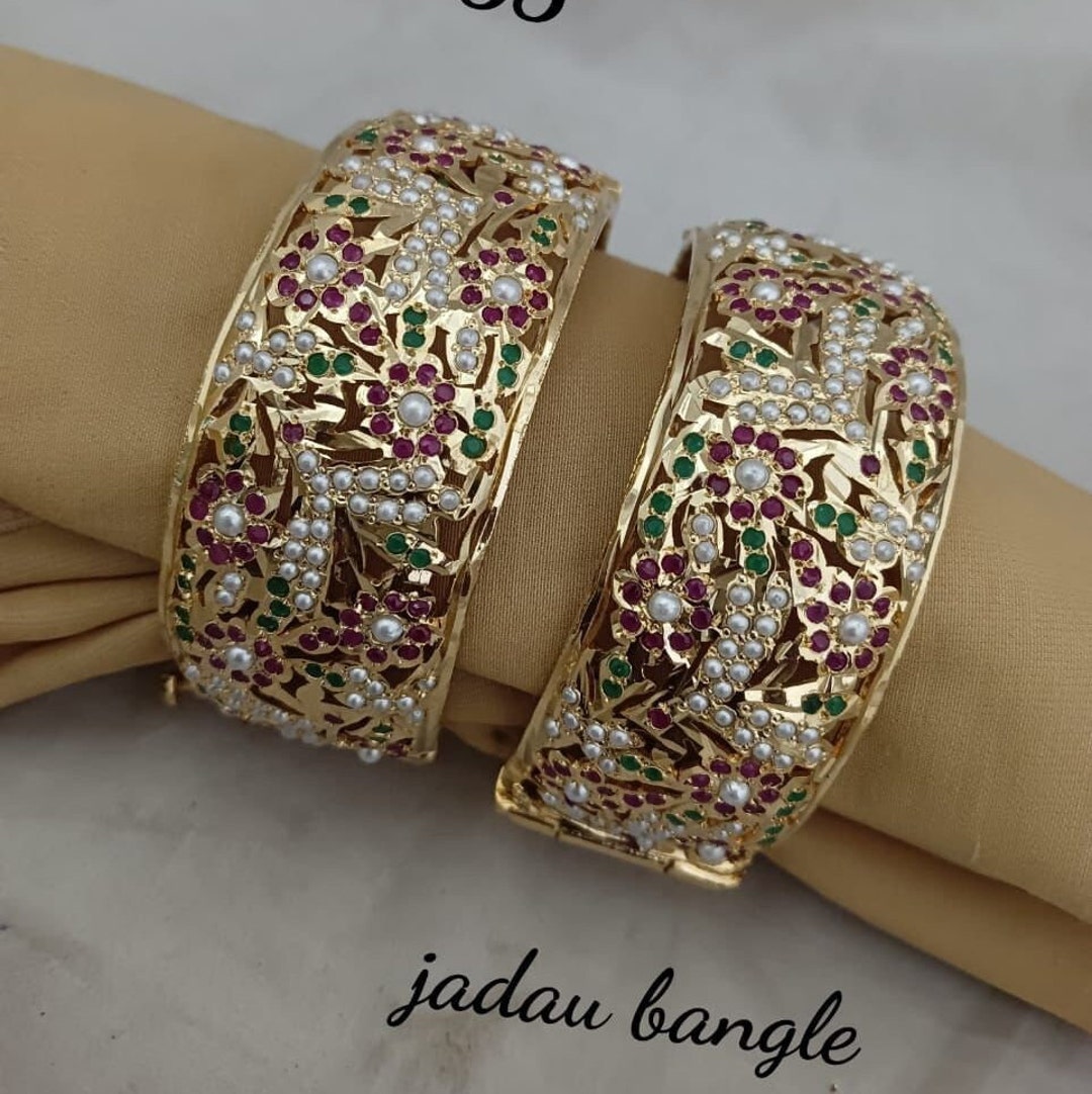 Gold Finish Jadau Bangles (Set of 2) Design by Saga Jewels at Pernia's Pop  Up Shop 2024