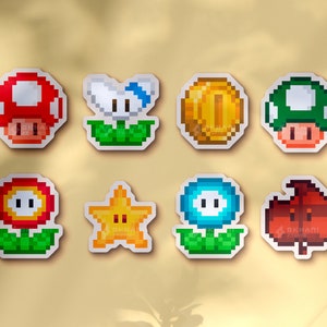 Adesivi di Mario | Fungo rosso, Fungo verde, Moneta, Super foglia, Fiore di fuoco, Fiore di ghiaccio, Fiore boomerang, Stella, Adesivo kawaii
