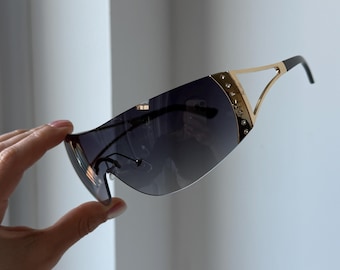 Black gradient lenses golden wrap sunglasses frame rave
