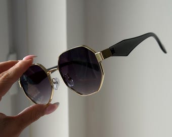 Gafas de sol degradadas con montura dorada y gafas de sol negras para hombre