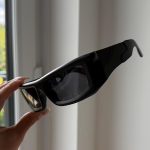 black lenses black frame futuristic sunglasses