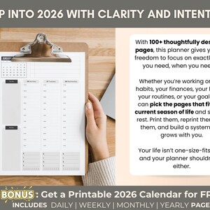 May include: A clipboard with a 2026 planner, featuring a calendar and daily, weekly, and monthly sections. The text reads "Step into 2026 with Clarity and Intention." Includes a bonus printable calendar.