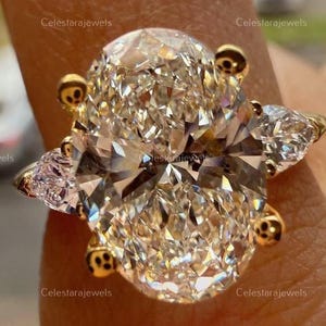3 Carat IGI Certified E/VVS2 Oval Cut Three Stone Lab Grown Diamond Engagement Ring, Side Matching Pear Shaped Diamonds, 14k Yellow Gold
