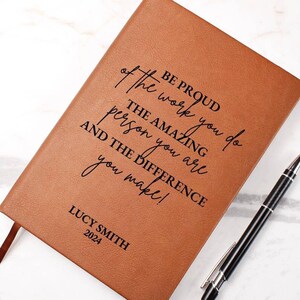 May include: A brown leather-bound journal with the inscription "Be proud of the work you do. The amazing person you are and the difference you make!"  The journal is personalized with the name "Lucy Smith" and the year "2024".