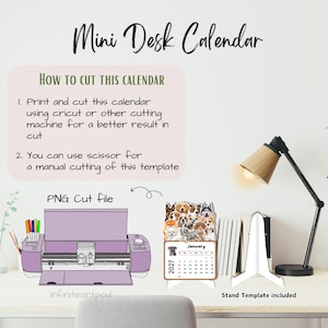 May include: A digital template for a 2027 mini desk calendar featuring a collage of various dog breeds. The graphic includes instructions for cutting with a Cricut machine or scissors, a PNG cut file illustration, and a white stand template.
