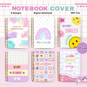 Puede incluir: Una descarga digital con seis diseños de portadas de cuadernos tamaño A5. Las portadas muestran colores pastel, arcoíris, caras sonrientes y citas inspiradoras como "Shine Soft, Dream Loud". Los cuadernos tienen encuadernación en espiral.