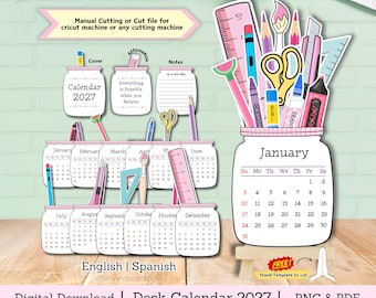 May include: A 2027 desk calendar digital download featuring mason jar-shaped pages for each month. The design includes illustrations of school and office supplies like rulers, scissors, glue, and pens. Text includes 'Calendar 2027', 'Everything is Possible when you Believe', and month names.