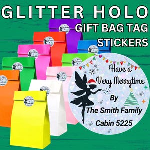 May include: A collection of colorful paper gift bags featuring circular glitter holographic stickers. The stickers display a fairy silhouette, a Christmas tree, snowflakes, and the text: Have a Very Merrytime By The Smith Family Cabin 5225.