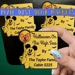 May include: A square yellow glittery magnet featuring a black graphic of a ghost with mouse ears holding a pumpkin balloon. The text reads Halloween On The High Seas, By The Taylor Family, Cabin 5225, with small black bat silhouettes scattered around.