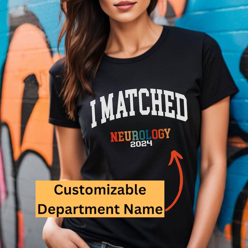 May include: Black t-shirt with the text "I MATCHED" in white and "NEUROLOGY 2024" in rainbow colours. The text is customizable.