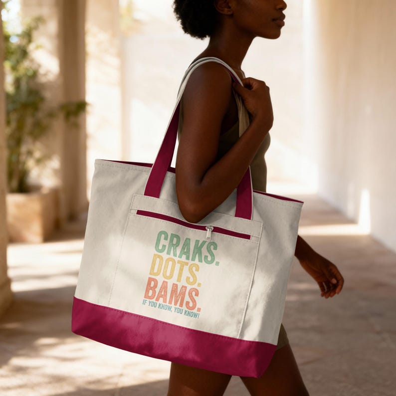 Tote bag with "Craks. Dots. Bams. If you know, you know." text.