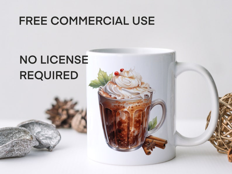 May include: White ceramic mug with a design of a glass of hot chocolate topped with whipped cream and cinnamon sticks. The text "FREE COMMERCIAL USE NO LICENSE REQUIRED" is printed on the mug.