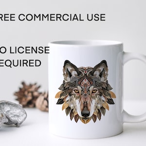 May include: White ceramic mug with a colorful wolf illustration. The wolf's fur is made up of intricate patterns of leaves, feathers, and geometric shapes. The mug has a black handle and the text "FREE COMMERCIAL USE NO LICENSE REQUIRED" is printed on the mug.