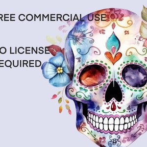 Puede incluir: Una ilustraci&oacute;n acuarela colorida de una calavera de az&uacute;car con flores. La calavera tiene un fondo blanco con detalles coloridos y un coraz&oacute;n rosa. Las flores son azules, rosas y verdes. El texto "FREE COMMERCIAL USE NO LICENSE REQUIRED" es visible en la imagen.