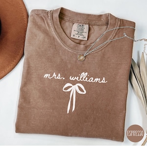 Custom Mrs Shirt, Bride Comfort Colors Shirt, Coquette Bride Bow Tee Shirt, Wedding Gift for Her, Gift for Fiance, Future Mrs Name Bow Shirt