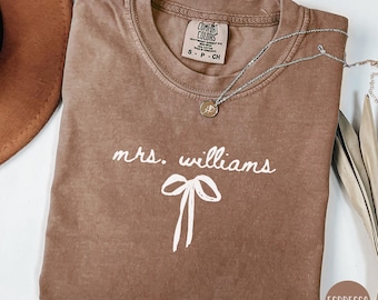 Custom Mrs Shirt, Bride Comfort Colors Shirt, Coquette Bride Bow Tee Shirt, Wedding Gift for Her, Gift for Fiance, Future Mrs Name Bow Shirt