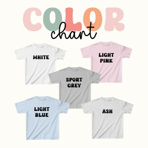 May include: A color chart graphic with the word "COLOR" in pastel colors and the word "chart" in black script. Five t-shirts are displayed, each in a different color: white, light pink, sport grey, light blue, and ash. Each shirt has its color name printed on it.