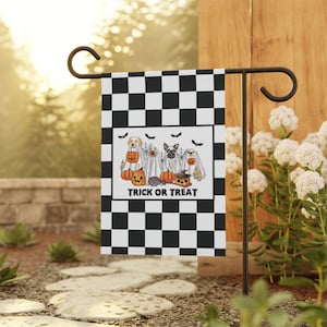 May include: A Halloween-themed garden flag with a black and white checkered pattern. The flag features a central design of dogs dressed in Halloween costumes, surrounded by pumpkins and bats, with the words "TRICK OR TREAT".