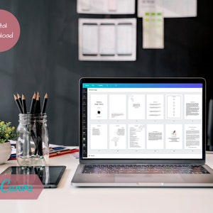 May include: A laptop computer displaying a digital document with text and images. The document is divided into sections with headings and subheadings. The laptop is on a desk with a glass jar of pencils, a plant, and a coffee mug.