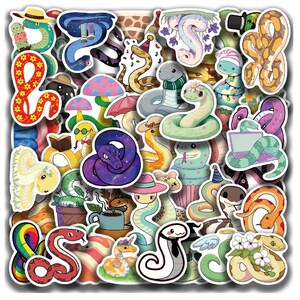 May include: A collection of numerous die-cut vinyl stickers featuring various cartoon snakes in diverse colours, patterns, and themes, including snakes with hats, flowers, food items, holiday decorations, and accessories arranged in a dense collage.