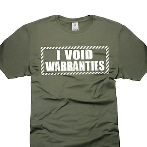 May include: A green t-shirt with the text "I VOID WARRANTIES" in a white box with black stripes.