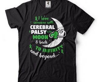 Może przedstawiać: Czarny T-shirt z zieloną wstążką i zielonym sercem na białym półksiężycu. Tekst brzmi "Kocham kogoś z porażeniem mózgowym do księżyca i z powrotem & w nieskończoność i dalej..."