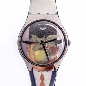 Swatch New Gent - SUOZ350 - Le Fils De L'Homme (René Magritte) - Occasion remis à neuf