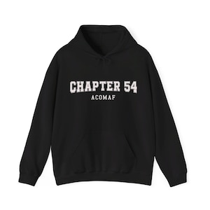 May include: Black hoodie featuring the text "CHAPTER 54" in white, above "ACOMAF". The sweatshirt has a front pocket and a drawstring hood. A casual, comfortable garment.