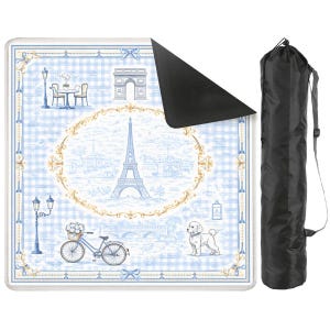 May include: A picnic blanket with a blue and white checkered pattern and a Parisian theme. The design includes the Eiffel Tower, a bicycle, and a dog. A black carrying bag is included.