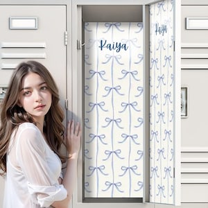 May include: A white locker with a blue bow pattern on the inside. The name "Kaiya" is written in blue script on the locker door and inside. The locker is open, revealing the bow pattern.