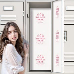 May include: A light gray metal locker with an open door, featuring a white interior liner decorated with repeating pink text that reads YOUR DESIGN HERE, accented by small heart and star icons, and a nameplate slot on the exterior door.