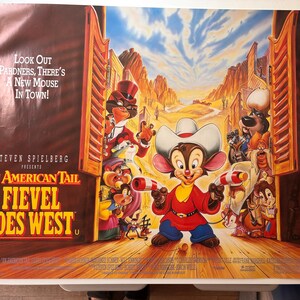 May include: A movie poster for "An American Tail: Fievel Goes West" featuring a mouse in a cowboy hat holding candy canes. The poster has text that reads "Look Out Pardners, There's A New Mouse In Town!" and "Steven Spielberg Presents". The background depicts a desert scene.