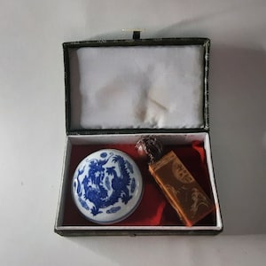 Vintage Chinese carved stone stamp with red ink