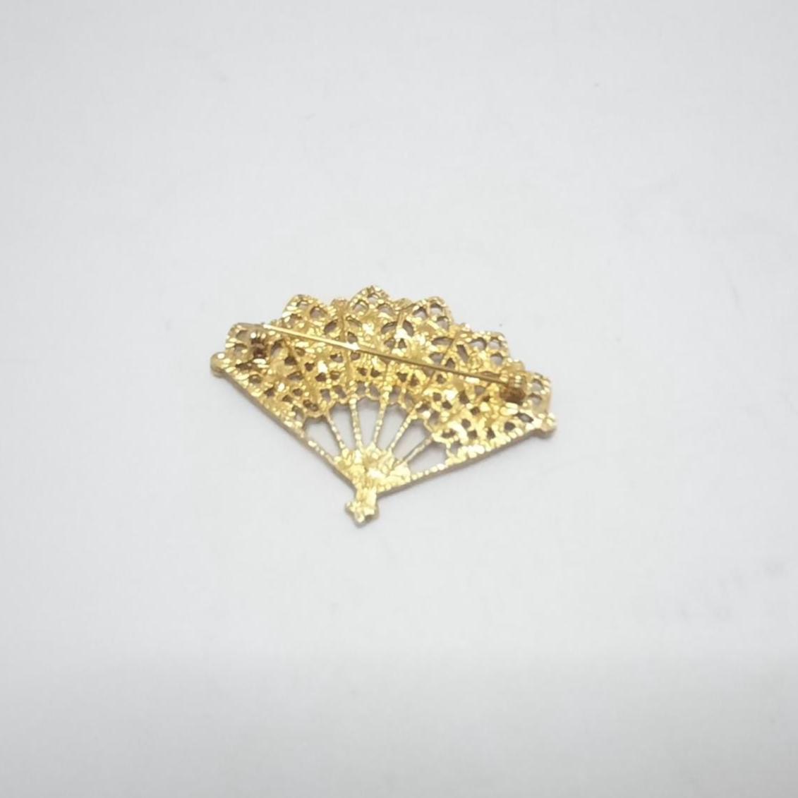 spilla gioiello ventaglio dorato - Produzione di bijoux Ave Caprice spilla gioiello ventaglio dorato - Produzione di bijoux Ave Caprice