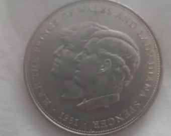 Commemerative coin featuring Charkes and Lady Diana 1981