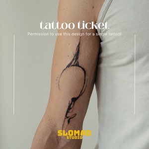 May include: A black and white abstract tattoo design on a person's arm. The design is a single line that curves and loops, creating a unique and modern look. The text "tattoo ticket" and "Permission to use this design for a single tattoo!" is displayed above the design. The text "SLOMAD STUDIO" is displayed below the design.