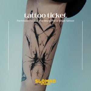 May include: Black and white abstract tattoo design on a person's arm. The design features a series of swirling lines and shapes, creating a sense of movement and energy. The text "tattoo ticket" and "Permission to use this design for a single tattoo!" is visible at the top of the image. The text "SLOMAD STUDIO" is visible at the bottom of the image.
