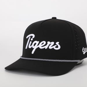 May include: Black baseball cap with a white rope trim and the word "Tigers" embroidered in white on the front.